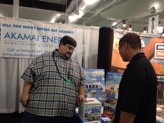 John at the Akamai Energy booth explains our Solar Photovoltaic service and latest promotions